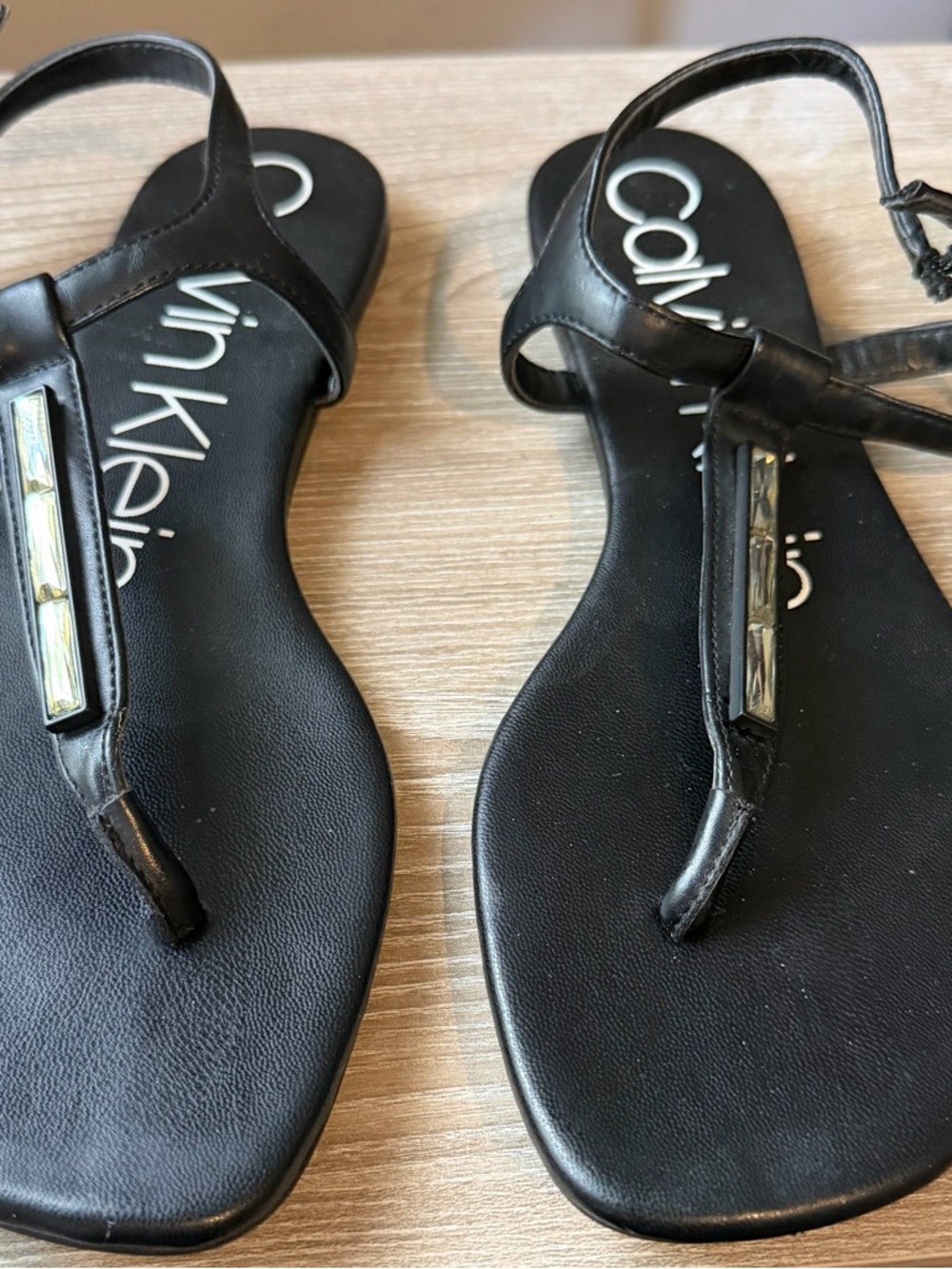 Calvin Klein Black T-Strap Sandals with Metallic Accents